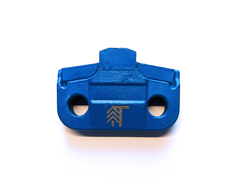 Close-up of triple carbide tips on Prinoth BCS02 replacement mulcher tooth